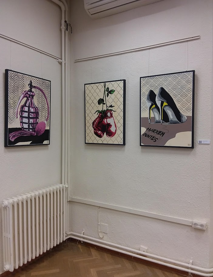 picks up a pen,
starts playing with it